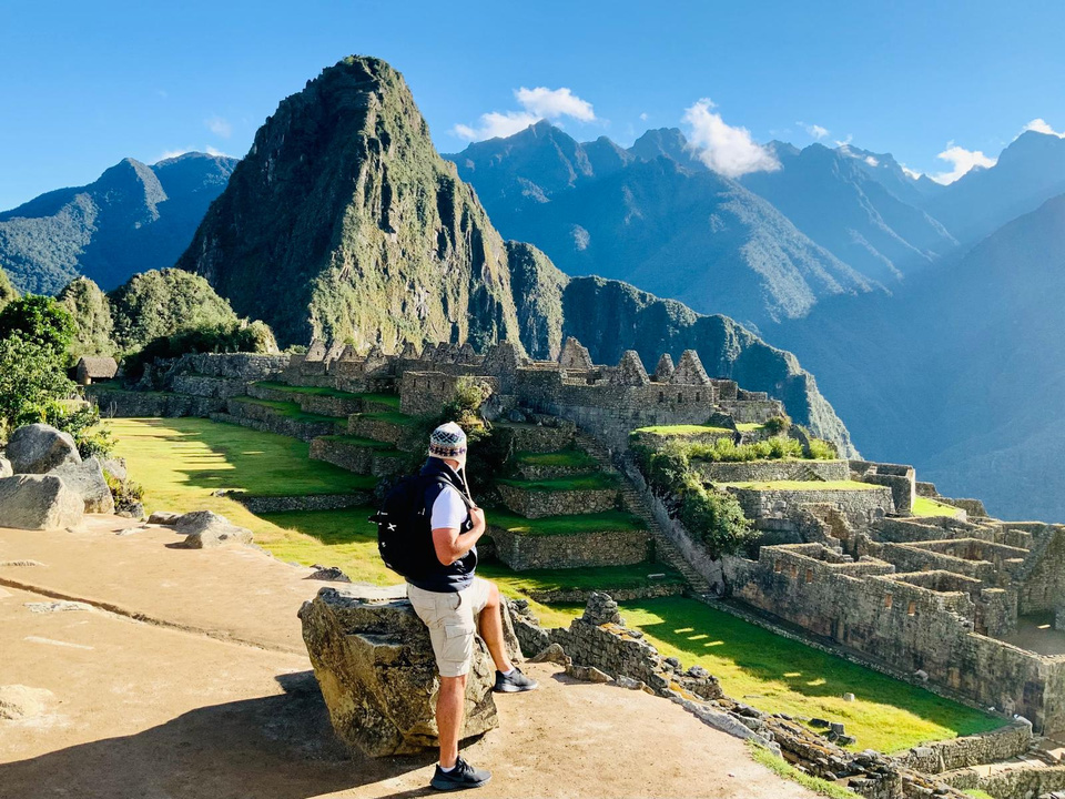 Matthew Patti traveling near some mountains 